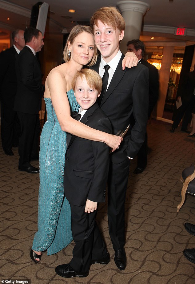 “They're at the age where they're starting their careers and they're quite uncertain about what's going to happen,” said Jodie; Jodie with sons Charlie and Kit in 2012