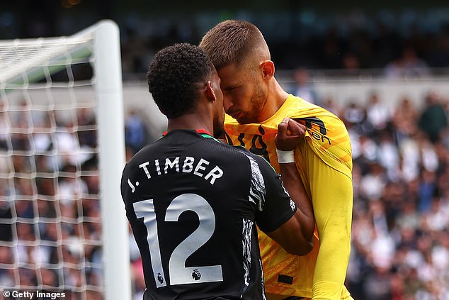 Timber then avoided a second yellow card by grabbing Tottenham goalkeeper Vicario by the shirt