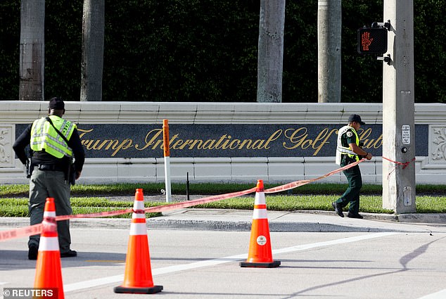 Police officers working after reports of shots fired outside Trump International Golf Course in West Palm Beach on Sunday