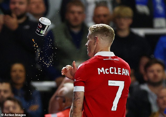 McClean pretended to take a sip of the drink before throwing it off the pitch as he was substituted