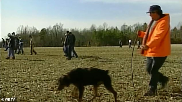 The case had baffled investigators who had been investigating the case for two decades. Locals are seen here in 2000 searching for the Degree