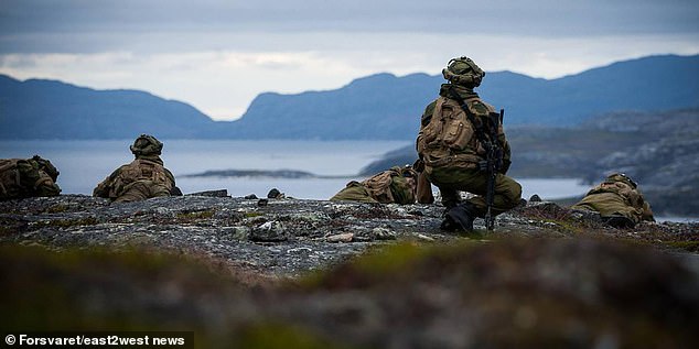 File photo shows Norwegian soldiers near the border with Russia