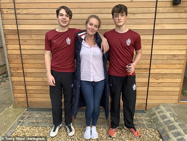 Tracy then began a romance with childhood friend Ashley Poundall and later had her two sons, Louis, 19, and Luca, 18 (pictured with sons)