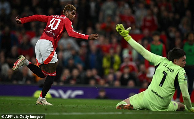 Rashford coolly passes the ball past the keeper and into the net to make it 5-0