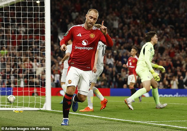 Eriksen drives away to celebrate firing his shot into the Barnsley goal with his feet