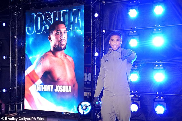 Joshua looked relaxed as he attended the ceremonial arrival for the fight in London