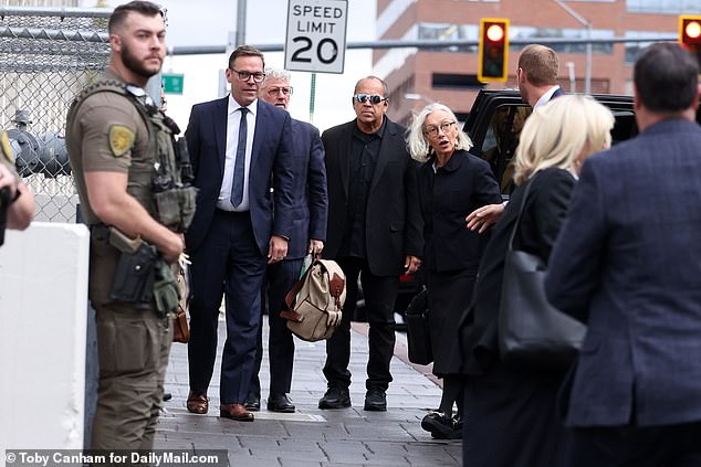 James, 51, and Prudence arrive at the courthouse with security on Tuesday