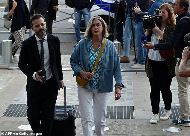 Caroline Darian (C) arrives on September 11 for the trial of her mother's former partner