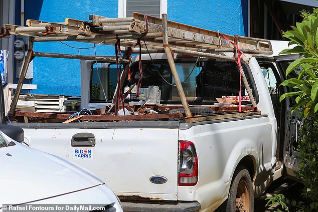 A white pickup truck in Routh's driveway has a Biden-Harris campaign bumper sticker on it