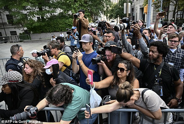 Members of the media gathered outside Combs's arraignment hearing in New York on Tuesday