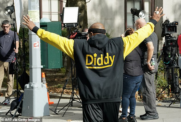 A supporter of the besieged Combs was photographed outside the courthouse