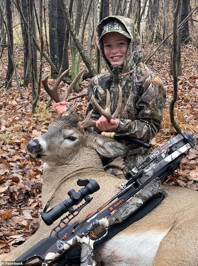 The two were deep in the woods of western Wisconsin, near the family's vacation home, when Owen first spotted the woodland beast. Pictured: Owen on the hunt in November 2022