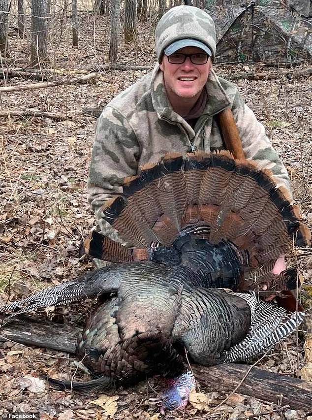 Ryan, 43, received 23 stitches in his cheek, along with seven stab wounds in his arm and another cut that required stitches after the near-fatal bear attack. Pictured: Ryan with a hunted turkey from a hunting trip in April 2022