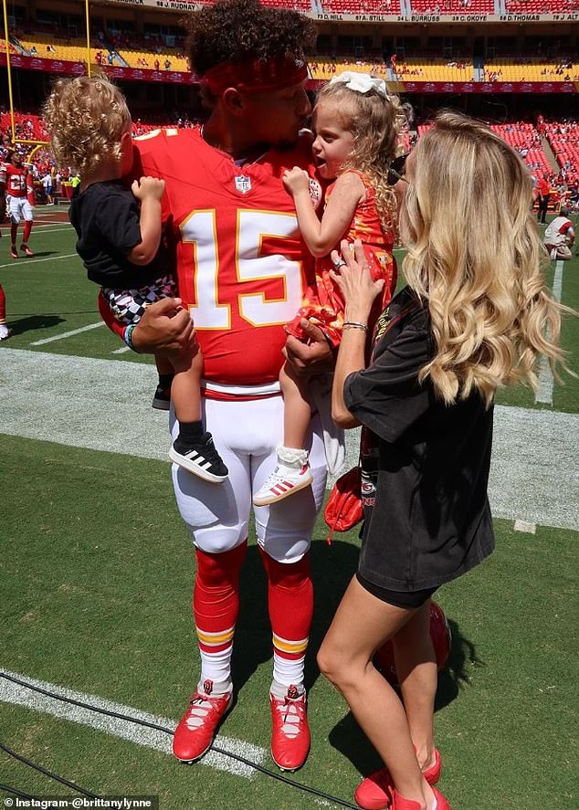 The Chiefs star's wife also shared a photo of their young family ahead of a game