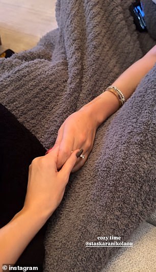 She also uploaded a short clip of her and Stassie holding hands while sitting on the couch, covered in a warm blanket