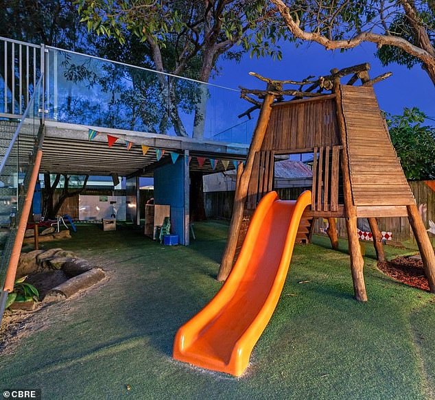 They would also have to clean the daycare playground (pictured) and water the gardens twice a week, while tidying up the 'front area' monthly.