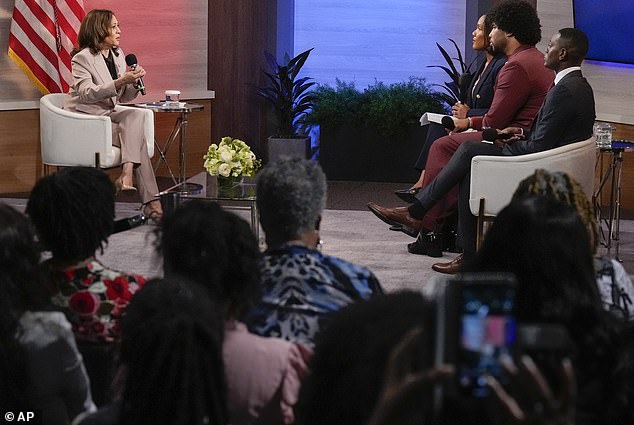 Democratic presidential candidate Vice President Kamala Harris Vice, left, is interviewed by National Association of Black Journalists members Gerren Keith Gaynor, far right, Eugene Daniels, second from right, and Tonya Mosley.