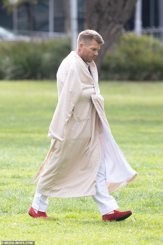 In between takes, David dresses in a comfortable dressing gown