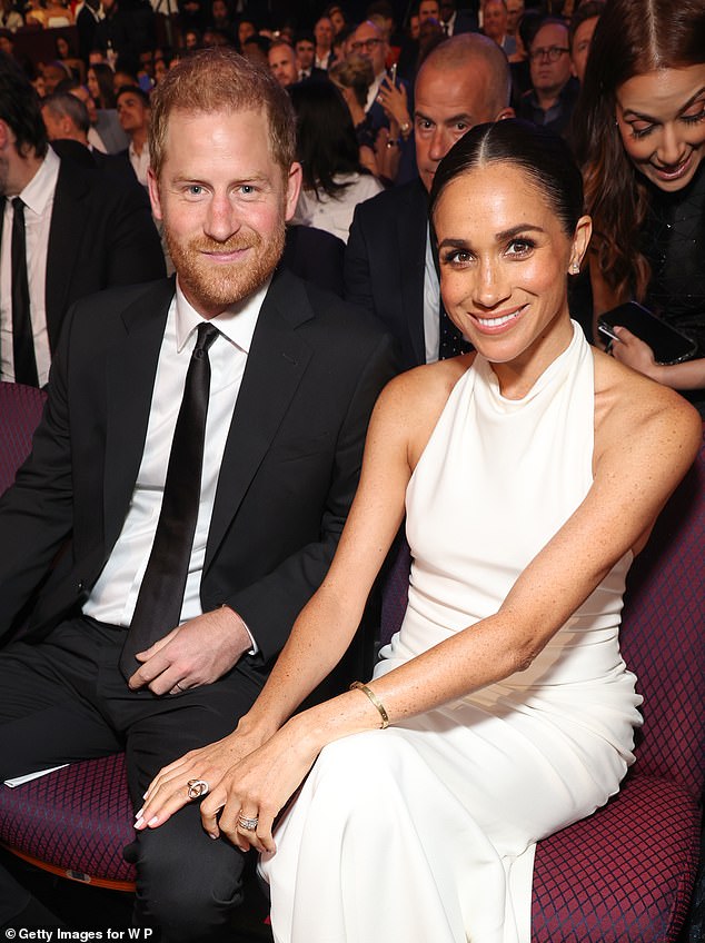 The Duke and Duchess of Sussex (pictured in July) celebrated National Voter Registration Day yesterday by engaging the Archewell team in a letter-writing activity