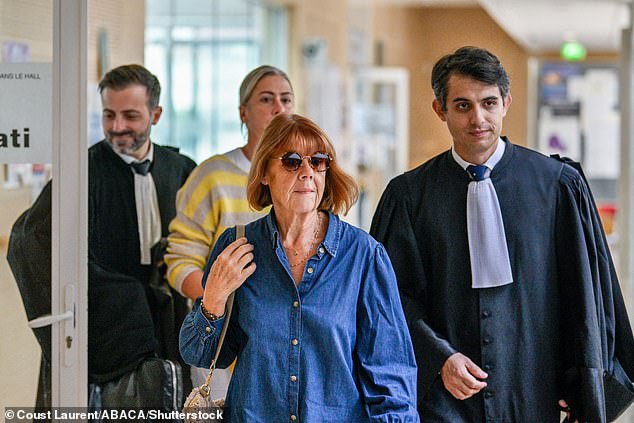 Gisele Pelicot, flanked by her lawyer Stephane Babonneau, arrives in court on September 18