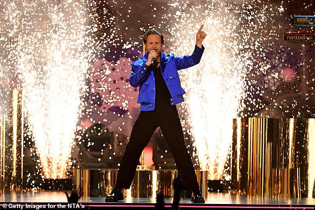 The singer took to the stage midway through the awards ceremony, which was broadcast live on ITV, to sing some of his best hits including Troublemaker and Heart Skips A Beat