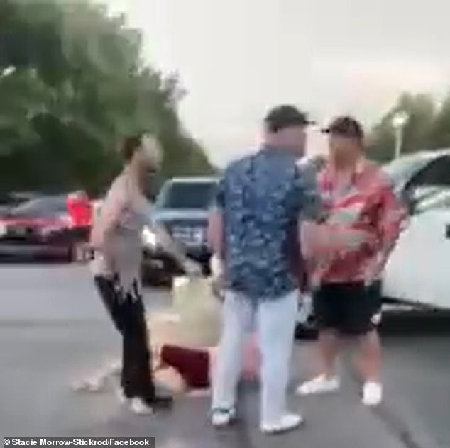 Raleigh was confronted in the video by Red Sox legend Kevin Youkilis (in blue), who had eaten at the same restaurant before the car crash that caused the incident