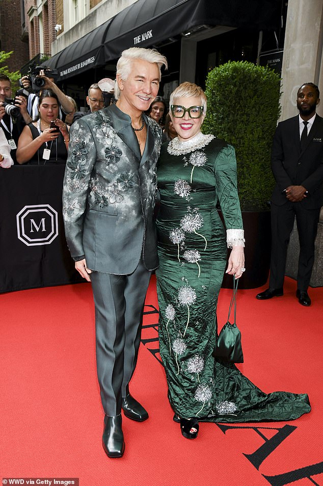 Pictured: Luhrmann and his wife of 27 years, designer Catherine Martin, at the Met Gala in May