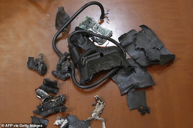 A photo taken in the southern suburbs of Beirut on September 18, 2024, shows the remains of exploded pagers displayed in an undisclosed location. Hundreds of pagers used by Hezbollah members exploded across Lebanon on September 17