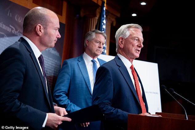 Senator Tommy Tuberville flanked by Senators Mike Lee (left) and Roger Marshall (right) as they call for additional Secret Service protection for former President Trump