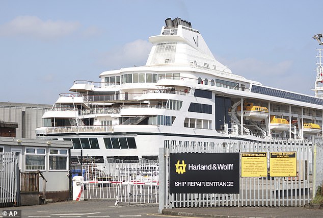 The Villa Vie Odyssey is moored at the Harland & Wolff shipyard in Belfast, infamous for building the Titanic over 100 years ago