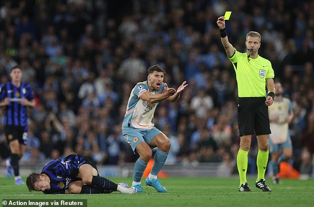 Ruben Dias received the only yellow card of the match and voiced his complaints to the referee