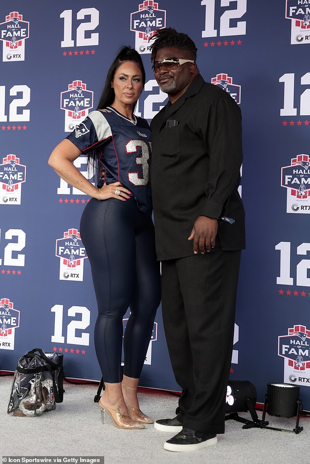 Patrick Pass and his wife Monique are seen before Tom Brady was honored in Foxborough