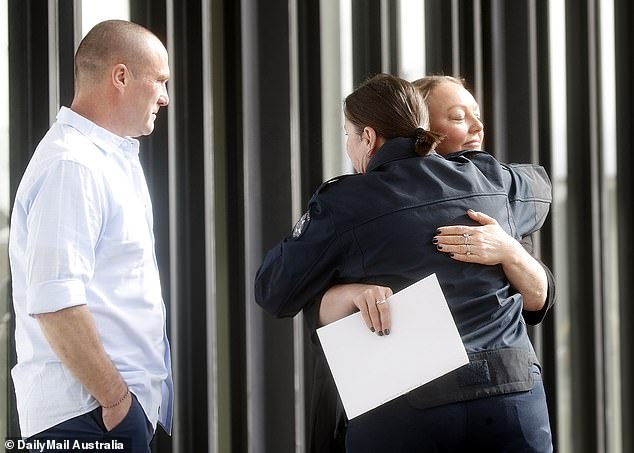 Ms McGuire's mother hugged a police officer outside the court before Thursday's hearing