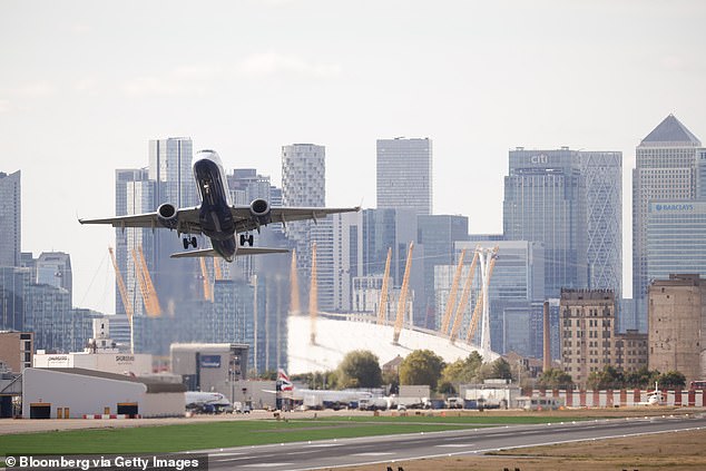 Every traveler is required to have their own ETA to enter Britain, including all children. (photo: archive photo of London City Airport)