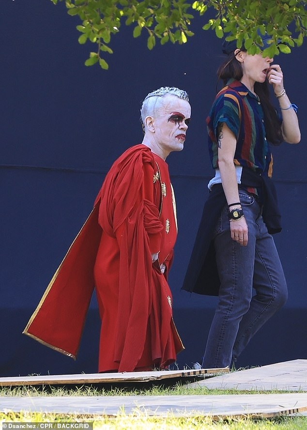 The actor's signature dark curls were transformed into a striking white mohawk