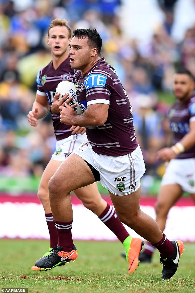 The former prop (pictured running with the ball) claims he suffered life-changing injuries during a training session in 2017