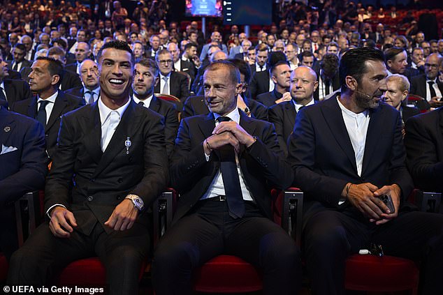 UEFA President Aleksander Ceferin (centre), pictured next to Cristiano Ronaldo and Gianluigi Buffon, has advocated the new format