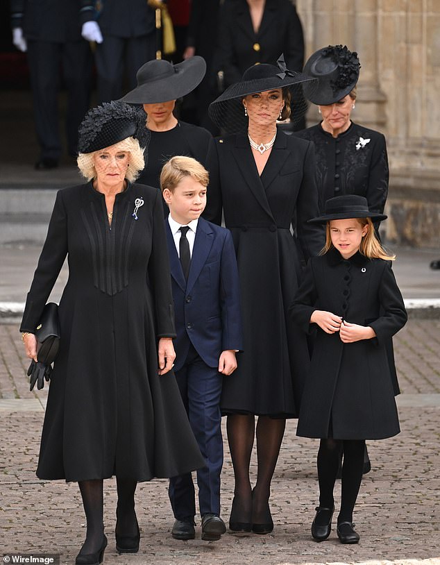 The Princess of Wales kept her style credentials high in an Alexander McQueen coat dress, modelled on a white version she wore to the Queen's Platinum Jubilee celebrations in June of that year.