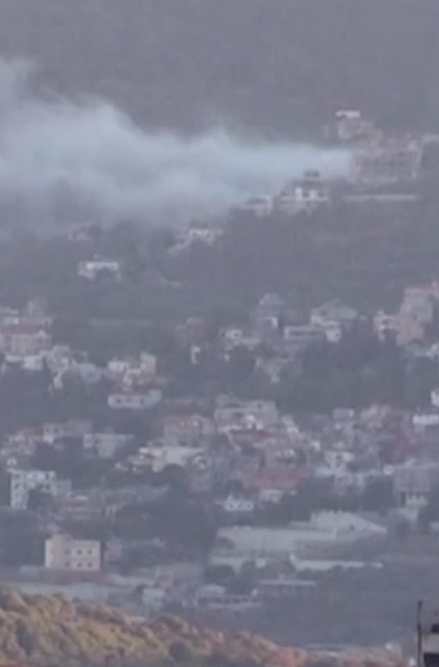 Thick smoke hangs over a settlement after a second wave of explosions hit Lebanon