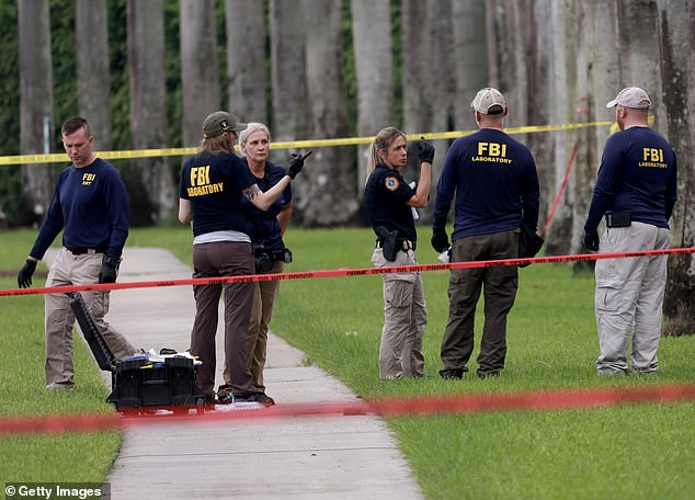 The attempt on Trump is unique because he is a former president trying to regain office and has now had to make two attempts. Pictured: Law enforcement personnel examine the area where the Secret Service discovered a potential assassin of former President Donald Trump at Trump International Golf Club on September 17, 2024 in West Palm Beach, Florida.