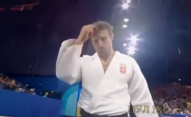 Footage shows Majdov making the sign of the cross during his participation in the Olympic Games