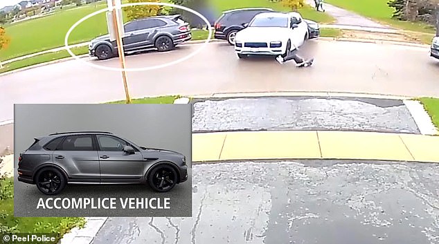 Police say they are also looking for another gray SUV they believe was involved in the theft