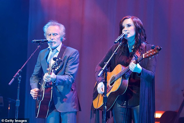 Souther is pictured with singer-songwriter Brandy Clark during a performance at the Linda Ronstadt Celebration at The Theatre at Ace Hotel in LA on December 11, 2016