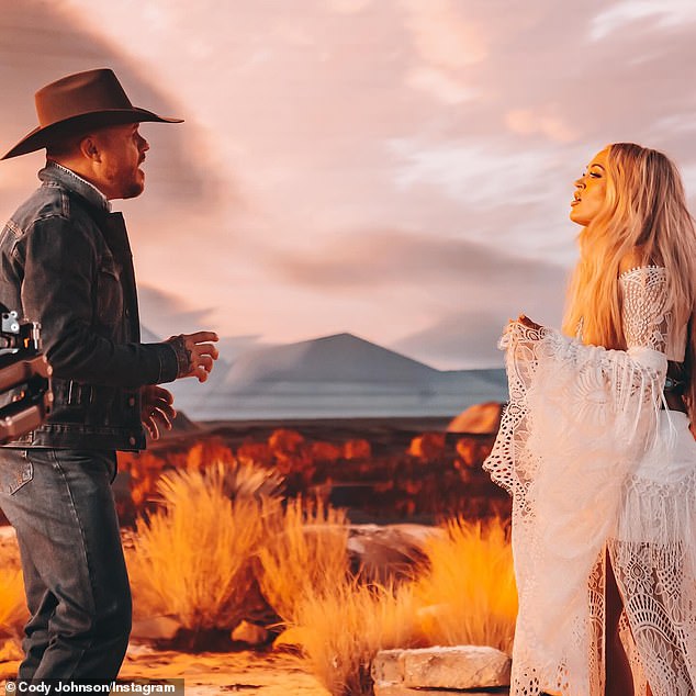 The 37-year-old Texas native shared photos from the upcoming music video for the highly anticipated song I'm Gonna Love You on Instagram on Wednesday.