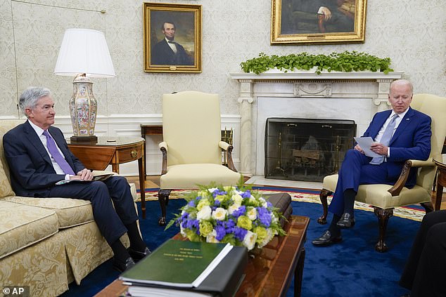 President Joe Biden (R) meets with Federal Reserve Chairman Jerome Powell (L) in the Oval Office on May 31, 2022