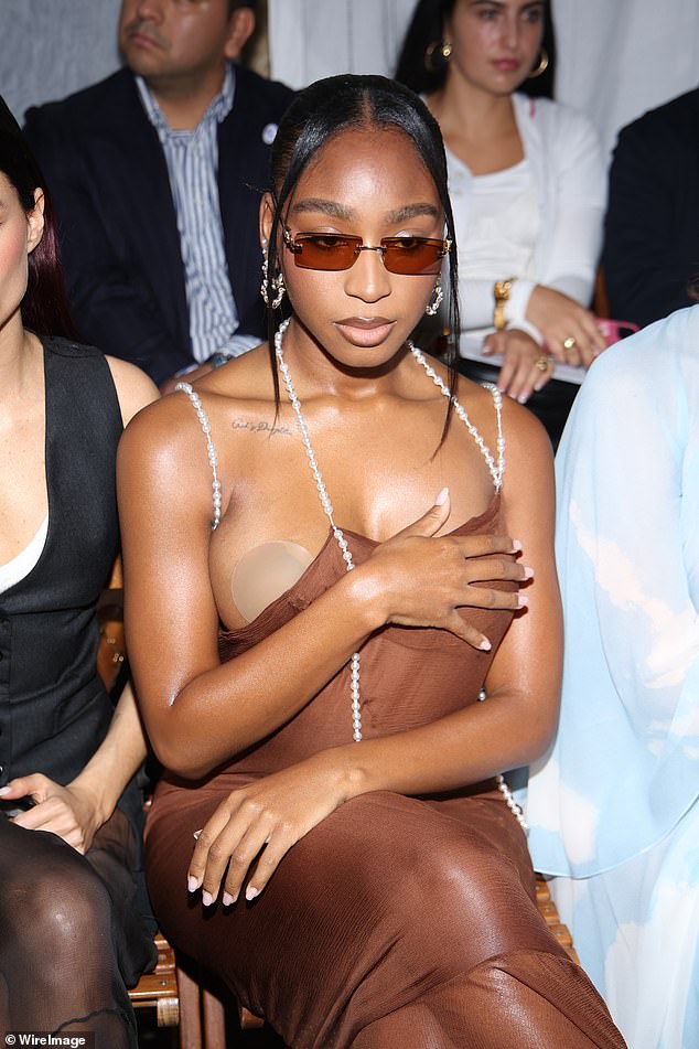 The 28-year-old singer, whose real name is Normani Kordei Hamilton, suffered an awkward wardrobe malfunction in the daring dress that featured pearly straps and a plunging neckline