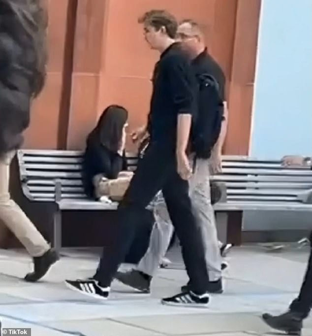 Barron walks across campus with his backpack over one shoulder and an understated casual look: a polo shirt, slacks and the season's must-have sneakers, Adidas Gazelles