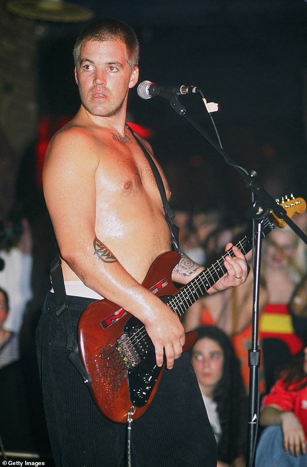 Nowell pictured on stage in New York in April 1996, about a month before he died of a heroin overdose on May 25, 1996