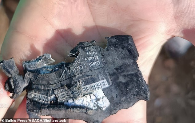 A hand shows the destroyed pager or pager that exploded on September 17