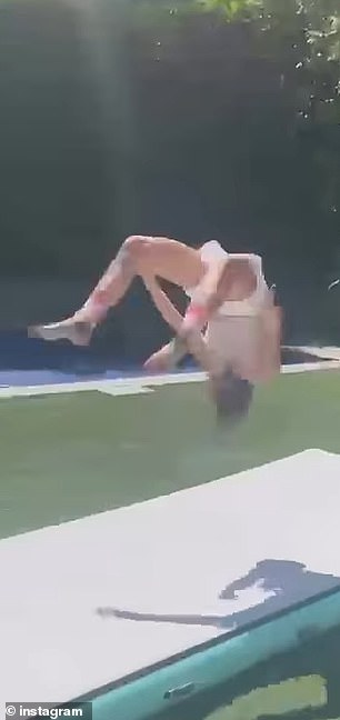 She added footage of the teen showing off her impressive tumbling skills on a training mat in the backyard of their Los Angeles home